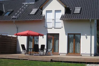 Image de SÜNN & Bries directly on the beach: large house with fenced garden+kayaks+Dsl