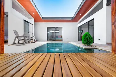 Image de Coral House, 5 min to the beach-  fiber optic internet and swimming pool