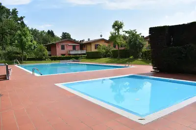 Image de Renovierte Wohnung/ Pool/ Tv/ Wlan/ Garage/ Familiy Friendly