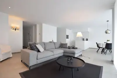 Image de Appartement א De Haan avec plage