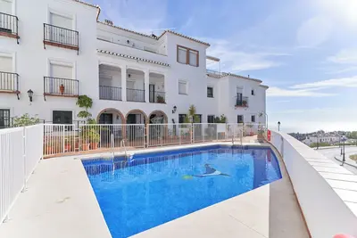 Image de Appartement \"In Balcón de Frigiliana\" avec vue sur la mer, piscine partagée et Wi-Fi