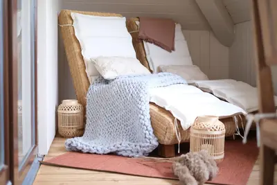 Image de See Um'S Eck vacation apartment - modern apartment with loggia directly on Lake Hain