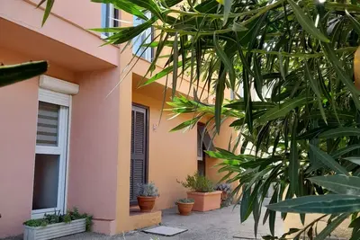 Image de Maison 3ch climatisée avec patio à 100 m de la plage, idéale pour les familles