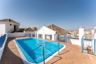 Image de Appartement 'Tres Coronas' avec vue sur la montagne, piscine partagée et Wi-Fi