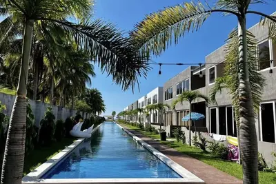 Image de Frente a la playa, bellos atardeceres en acojedor Apartamento hasta 10 peronas