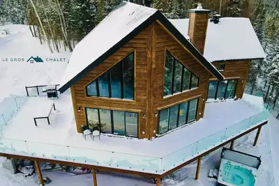 Image de Chalet bois: spa, cheminée, clim, internet haute vitesse, jeux pour enfants