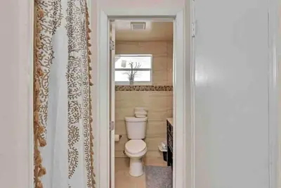 Image de Kids Welcomed! 10 Mins to beach Walk to stadium