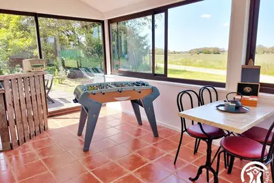 Image de Charmant Gîte à la Campagne avec Véranda, Babyfoot, & Randonnées – Idéal Familial!
