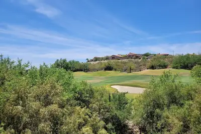 Image de Elegantly furnished with incredible golf course & mtn views from every room!