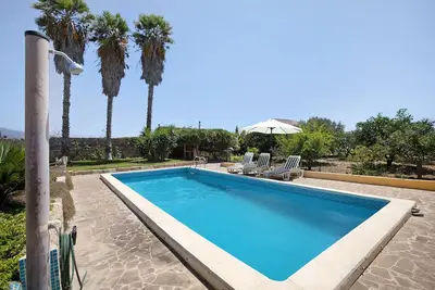 Image de Maison de vacances \"Las Tres Palmeras\" avec vue sur les montagnes, piscine partagée et Wi-Fi