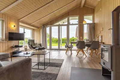 Image de Ferienhaus mit Strandkorb, Kaminofen, Whirlpool und Sauna