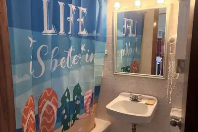 Image de Enchanting pastel mint space created for families adjoining rooms with bathrooms