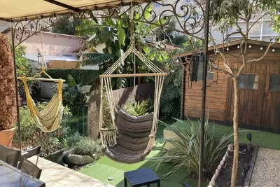 Image de En Ville: Maison avec Jardin et Jacuzzi