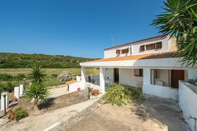 Image de Maison de vacances 'Cala Lunga' avec terrasse et jardin privés