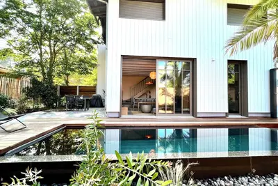 Image de Les cocons du bassin - La Villa du Lac - Plage 5min à vélo