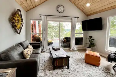 Short Walk To Water & Nestled In The Trees This Beautiful Cabin Has Lake Views