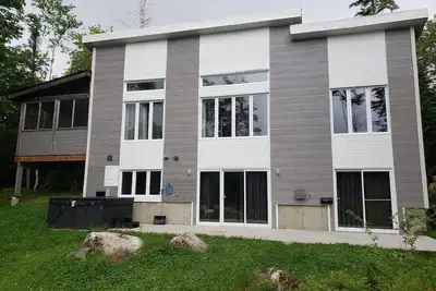 Image de Moderne Chalet, bord de lac, 4 chambres, avec Spa