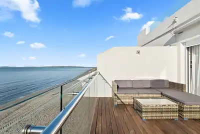 Image de Maison de vacances \"Casa En La Orilla De La Playa\" avec balcon, 2 terrasses privées et Wi-Fi
