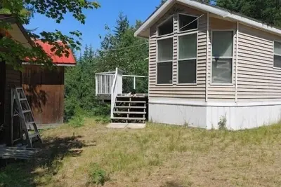 Image de Riondel Lake view guest cottage\n