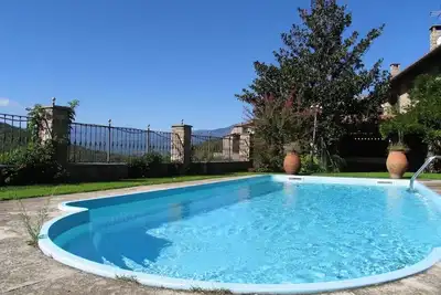 Image de House with swimming pool in the middle of nature