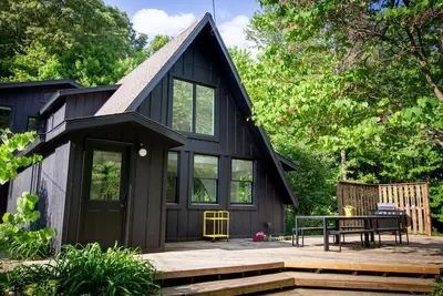 Image de A-Frame Cabin in the woods with pool & firepit that sleeps 19 in Ada, Mi (Pet Friendly! )