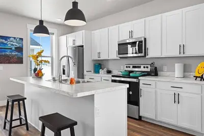 Image de Stay with Style in this Townhome