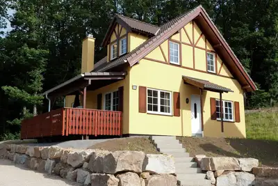 Image de Villa avec jacuzzi, solarium et cheminée
