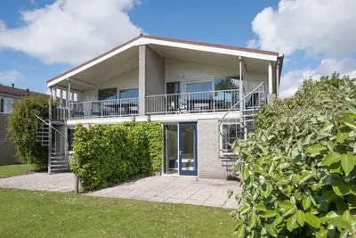 Image de Maison avec micro-ondes, dans un parc de vacances, plage accessible à pied
