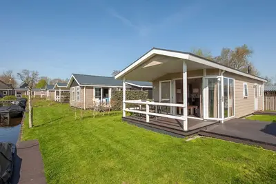 Image de Lodge avec barque électrique à centre de Giethoorn
