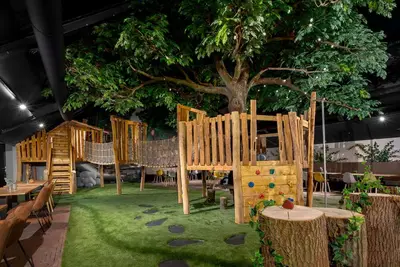Image de Lodge avec lave vaiselle sur un parc de vacances dans un environnement verdoyant