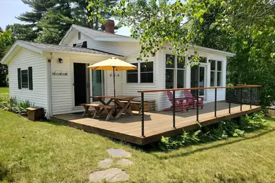 Image de Beautifully landscaped home on Panther Pond just 20 feet from the shore!