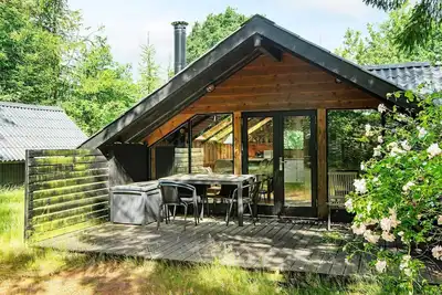 Image de Maison de vacances pour 5 a Glesborg-By Traum