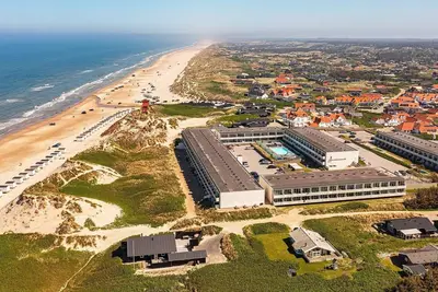 Image de Maison de vacances pour 8 dans un parc de vacances a Blokhus