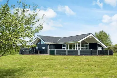 Image de Maison de vacances pour 8 a Hørve-By Traum