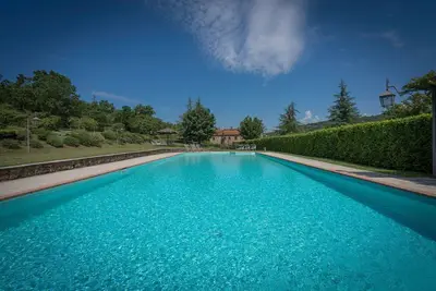 Image de Maison de Campagne à Badia Agnano avec 6 chambres à coucher, 13 couchages