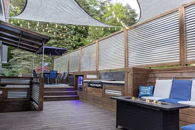 Image de Spacious home near Torch Lake w/custom back patio, steps away from public access