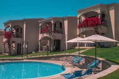Image de La fantastique Residenza Badus 2 chambres peut accueillir 6 personnes avec enfant avec vue sur la mer