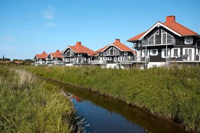 Image de Maison de vacances pour 8 dans un parc de vacances a Bogense