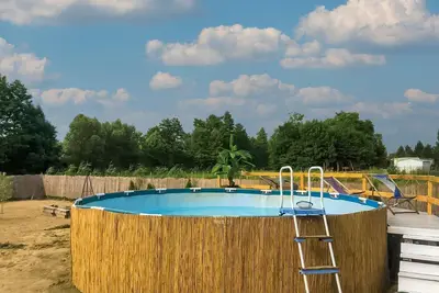 Image de Belle maison de vacances à Głuszyn avec piscine privée