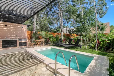 Image de Modern villa with private plunge pool, resort pool, patio, cinema & playground