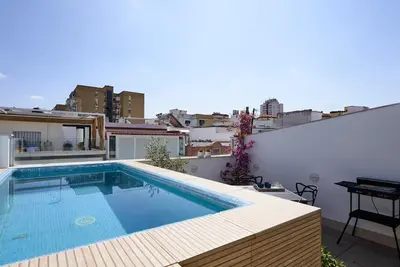Modern and smart house with a pool and a garage