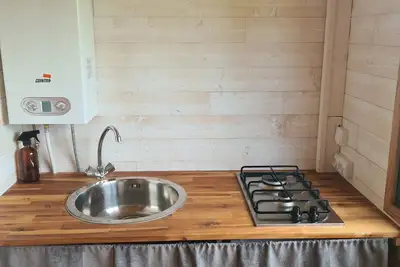 Image de Charmante Tiny House dans un camping Ă la ferme