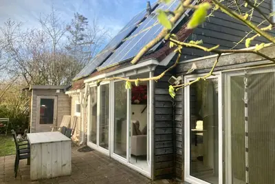 Image de Maison de vacances - 8 personnes - avec sauna au Lauwerslake près de la mer des Wadden
