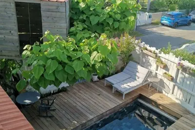 Image de Maison atypique côté bassin dans un quartier calme