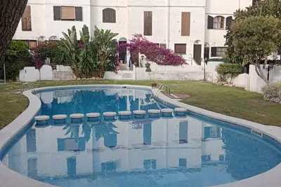 Image de Casa Adosada con Piscina Comunitaria y Jardín a 5 Minutos en Coche de las Playas