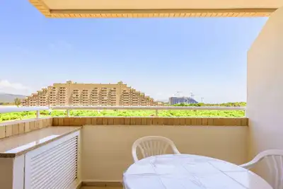 Image de Bel appartement pour 4 personnes avec Wifi, climatisation, piscine, Tv, terrasse et parking
