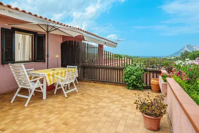 Image de Maison de vacances 'Villetta Meyer Lu Pitrali' avec vue sur la mer, terrasse privée et jardin privé