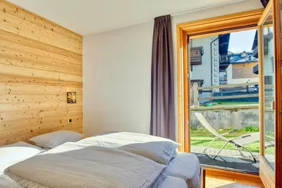 Image de Appartement 'Baita Lorella Legno' avec vue sur la montagne, terrasse partagée et Wi-Fi