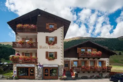Image de Appartement 'Baita Lorella La Tea' avec vue sur la montagne, terrasse partagée et Wi-Fi