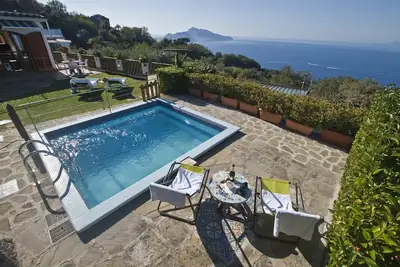 Image de Rentals in Italy - Casa 2 Ulivi with sea view, private pool and rooftop solarium